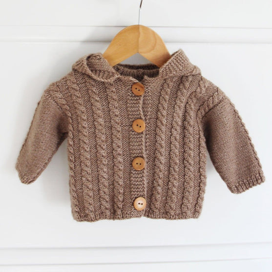 Cabled jacket with hood - Baby
3